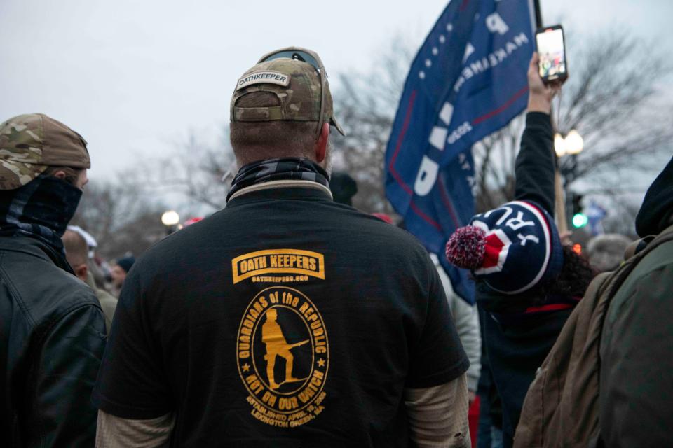 Men sporting gear identifying them as Oath Keepers are among the massive crowds gathering in Washington, D.C. to support outgoing President Donald Trump as the U.S. Congress meets to formally ratify Joe Biden as the winner of the 2020 presidential election on Jan. 6, 2021.