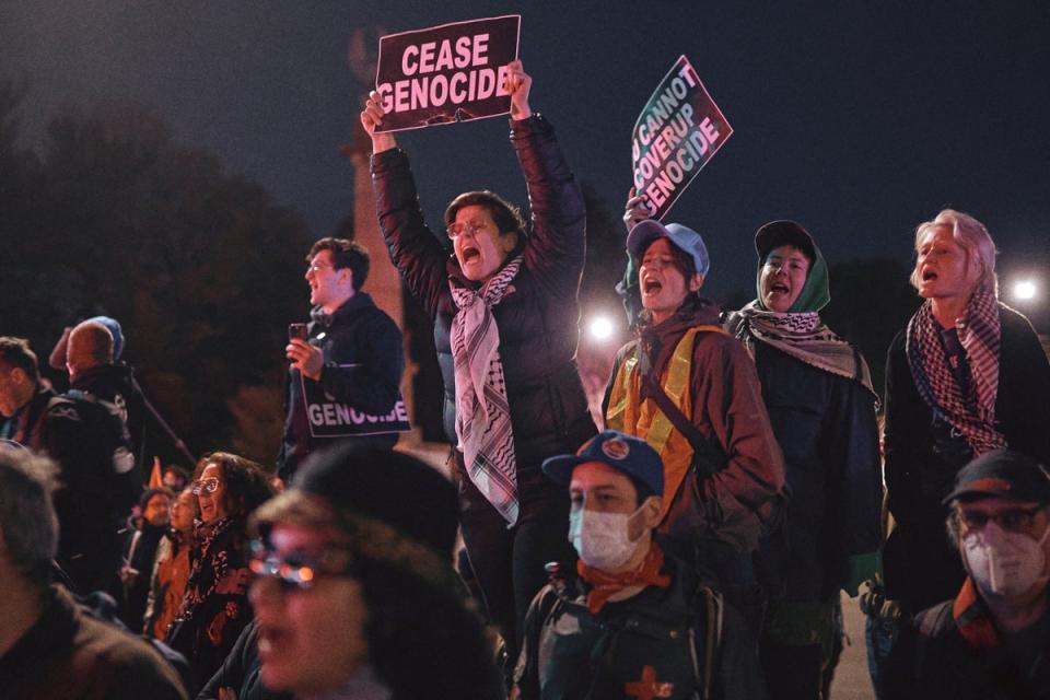 Protesters shout slogans during a pro-Palestinian demonstration demanding a permanent ceasefire in Gaza, near the home of Sen Chuck Schumer in Brooklyn (AP)