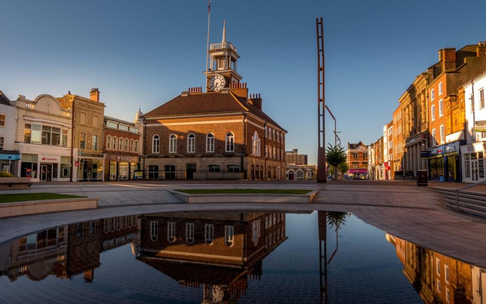 Reflection Of Buildings In water - Getty Images/EyeEm 