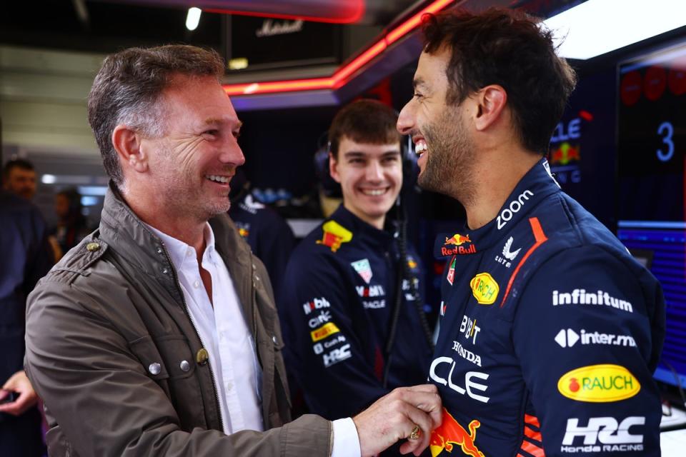 Ricciardo speaks to Christian Horner at last week’s test – hours later he was back on the grid (Getty)