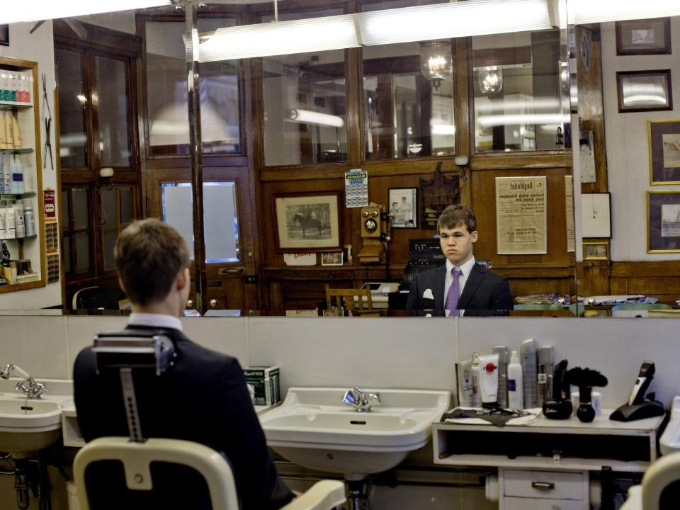 Magnus Carlsen, 19, sits in the chair at a barbers shop in Oslo on August 31, 2009.
