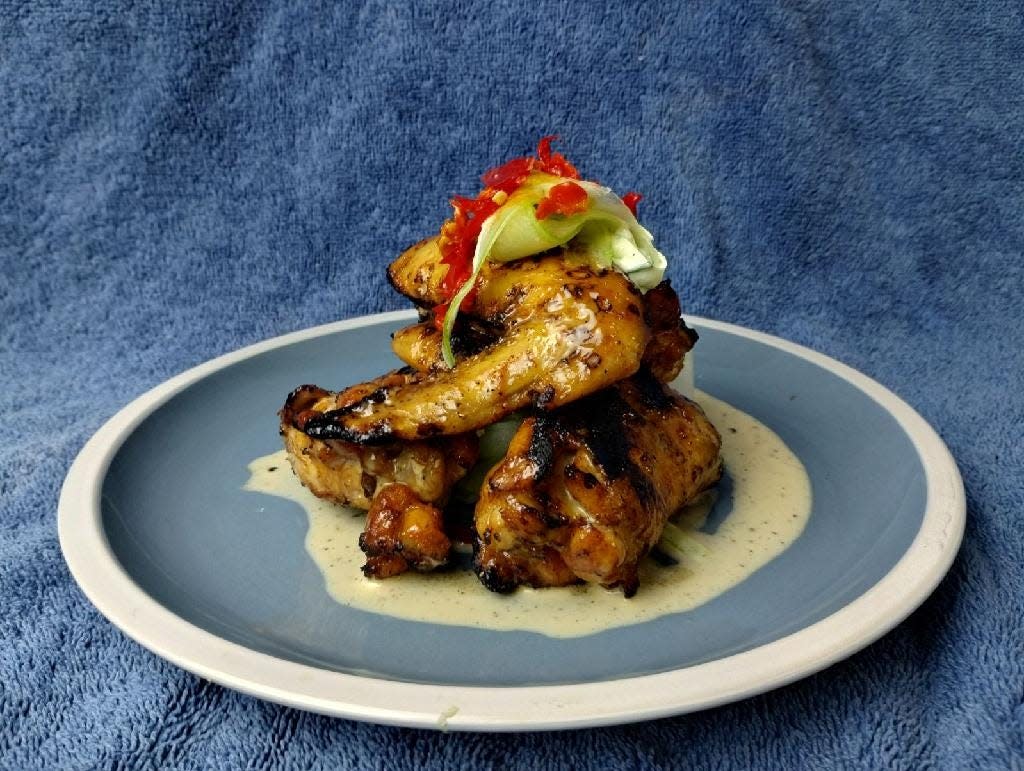 The GOAT Bar & Grill in Sussex is a restaurant that is slated to open in June. Pictured is the pickled chicken which will be featured on the menu.