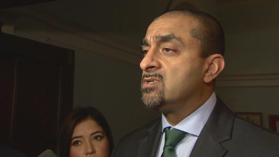 B.C. Housing Minister Ravi Kahlon, pictured at the Legislature on Nov. 23, 2023, says the province will move forward with controversial changes to how municipalities can respond to encampments.