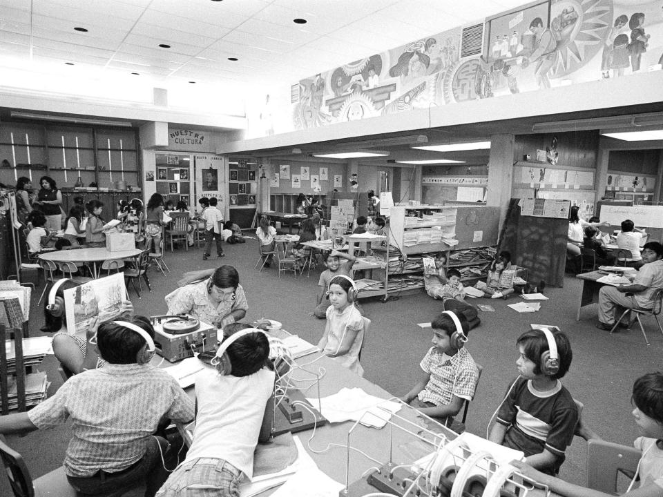 Children work on their various assignments in this open classroom in Crystal City, Texas, June 3, 1974.