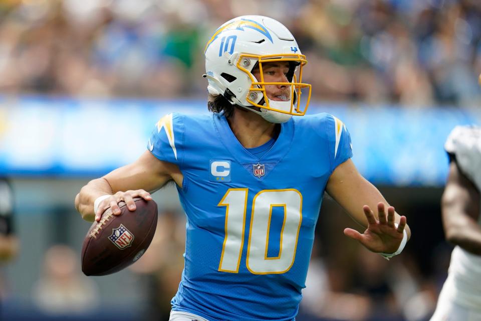 Los Angeles Chargers quarterback Justin Herbert (10) passes against the Jacksonville Jaguars during an NFL football game in Inglewood, Calif., Sunday, Sept. 25, 2022.