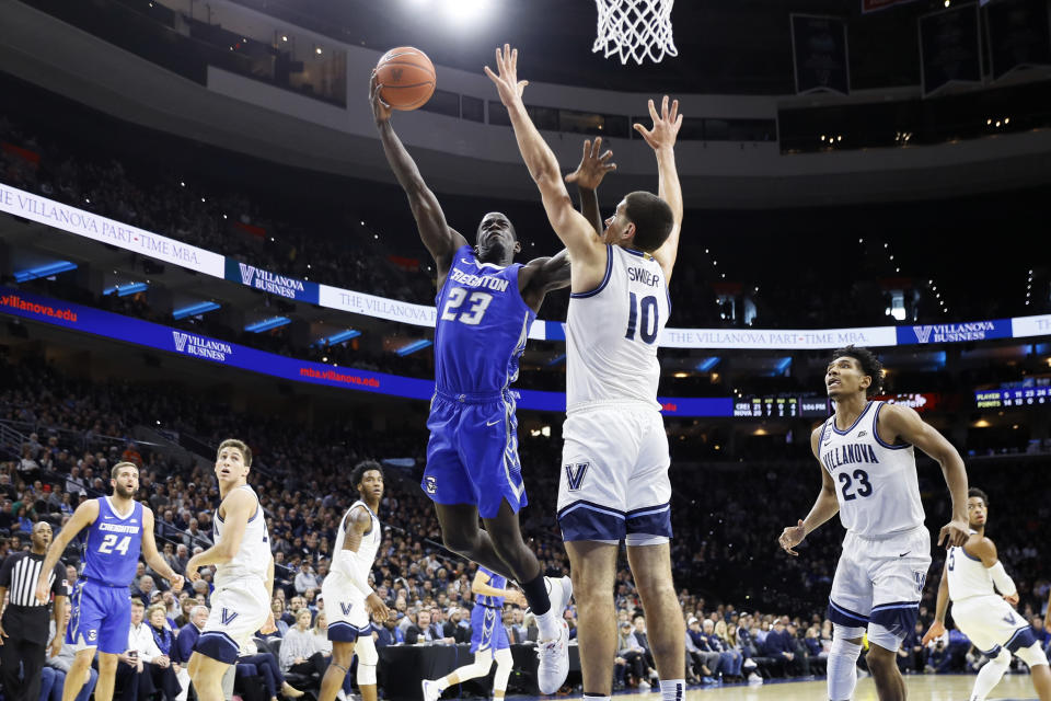 Creighton's Damien Jefferson (23) goes up for a shot against Villanova's Cole Swider (10) during the second half of an NCAA college basketball game, Saturday, Feb. 1, 2020, in Philadelphia. (AP Photo/Matt Slocum)