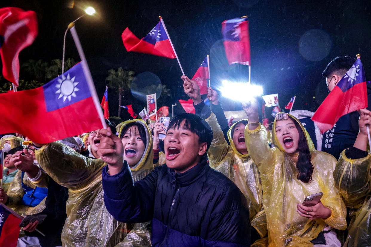 Supporters attend a Kuomintang campaign rally ahead of Taiwan's presidential election in Taipe (I-Hwa Cheng / AFP via Getty Images)