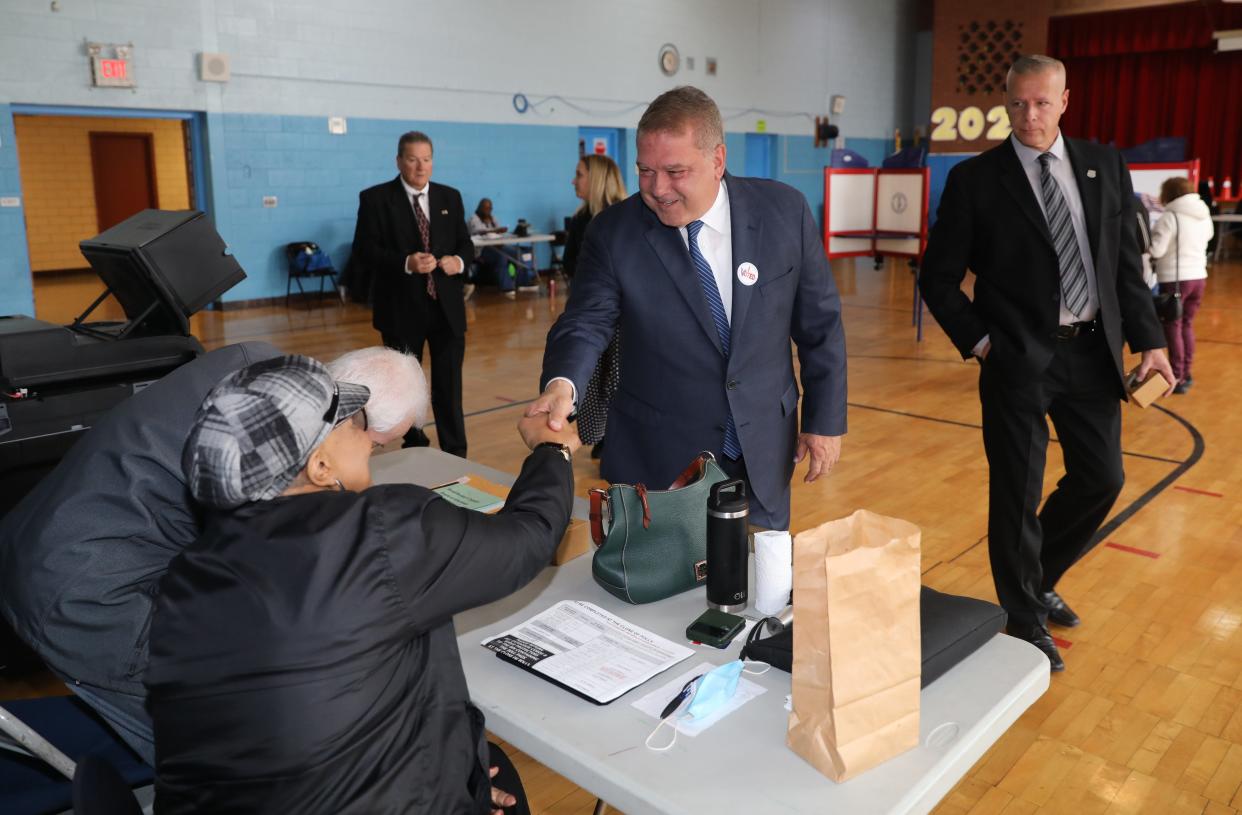 Yonkers Mayor Mike Spano greets election workers after voting at the Khalil Gibran School in Yonkers on Election Day, Nov. 7, 2023.