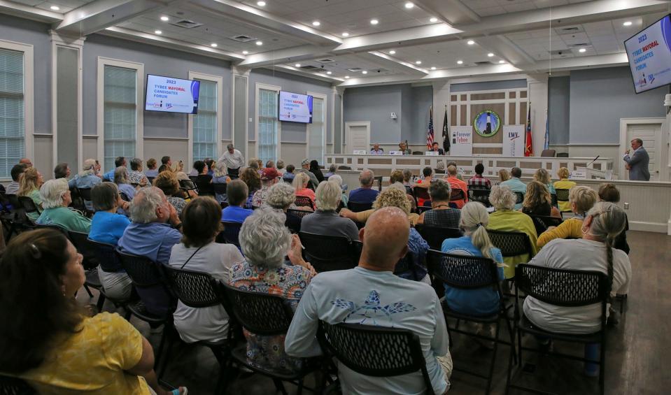 Locals listen as the candidates answer questions about how they will help their community during the Tybee Mayoral Forum on October 4th