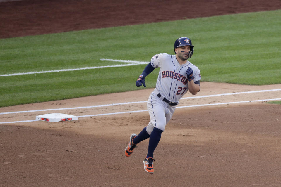 Houston Astros' Jose Altuve (27) rounds the bases after hitting a solo home run against the New York Yankees during the first inning of Game 3 of baseball's American League Championship Series, Tuesday, Oct. 15, 2019, in New York. (AP Photo/Seth Wenig)