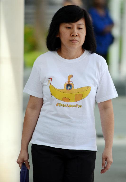 Mary Toh Ai Buay, the mother of teenage blogger Amos Yee, arrives at the state court to attend her son's hearing in Singapore on July 6, 2015