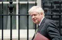 FILE PHOTO: Britain's Prime Minister Boris Johnson leaves Downing Street in London