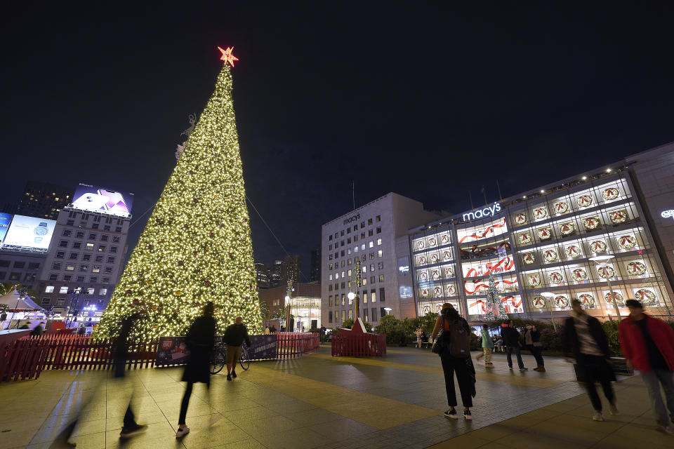 IMAGE DISTRIBUTED FOR MACY'S - Macy's Union Square kicks off the holiday season with the lighting of its 32nd annual Great Tree in Union Square on Thursday, Nov. 18, 2021, in San Francisco. (Tony Avelar/AP Images for Macy's, Inc.)