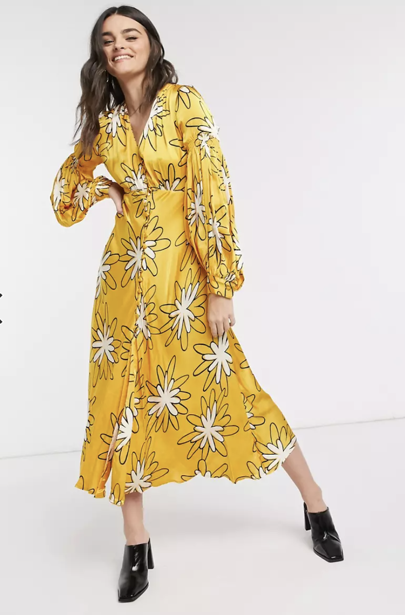  Ghost London midi dress in abstract floral in yellow, $170. 