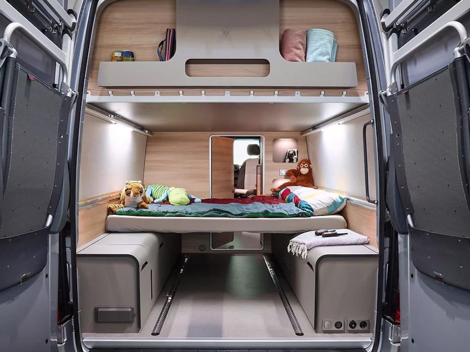 A children's bedroom in the rear of the van.