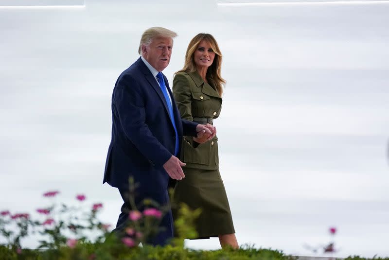 U.S. first lady Melania Trump departs with President Trump after a live address to the 2020 Republican National Convention from the White House in Washington