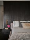 <p>Glints of gold and textural toppers such as cozy blankets and pillows, lend this black and white bedroom, designed by the firm <a href="https://www.chairish.com/shop/de-spec/portfolio" rel="nofollow noopener" target="_blank" data-ylk="slk:De-Spec;elm:context_link;itc:0;sec:content-canvas" class="link ">De-Spec</a>, elevated appeal.</p>