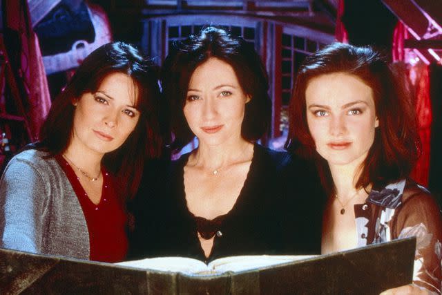 <p>WB Television Network/Courtesy Everett Collection</p> Holly Marie Combs, Shannen Doherty, and Lori Rom on 'Charmed'