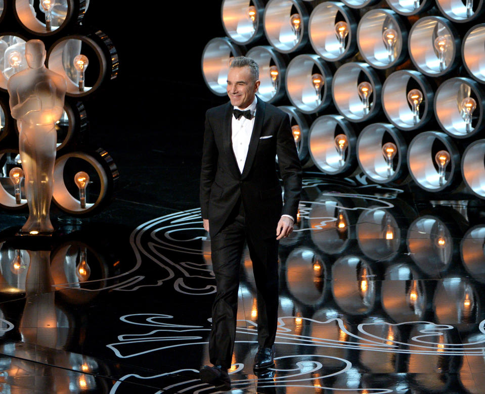 Presenter Daniel Day-Lewis walks on stage during the Oscars at the Dolby Theatre on Sunday, March 2, 2014, in Los Angeles. (Photo by John Shearer/Invision/AP)