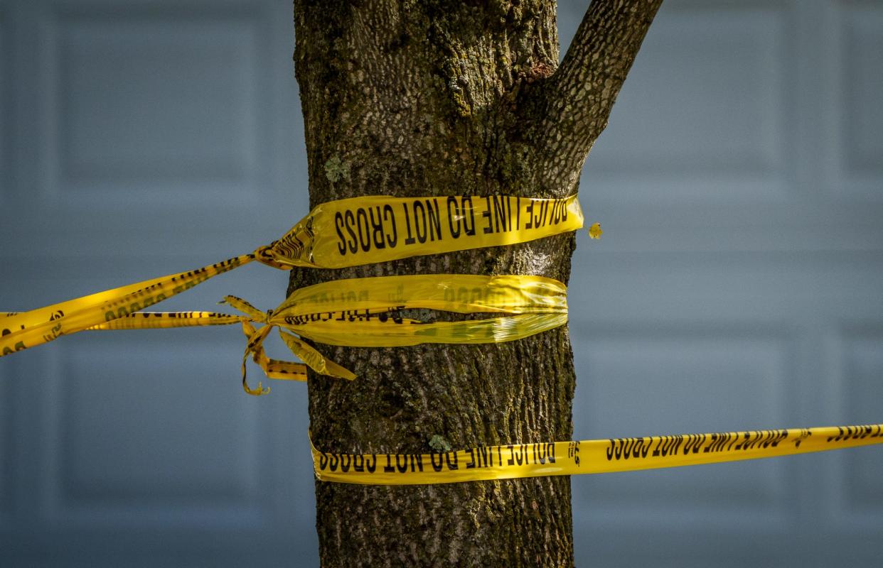Crime scene tape hangs at the scene of a double shooting Sept. 28, 2022 in the 7300 block of Glensford Drive.