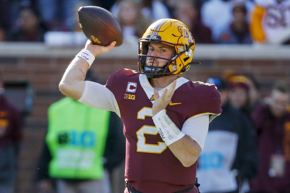 Minnesota quarterback Tanner Morgan (2) passes against Nebraska in the first quarter of an NCAA college football game Saturday, Oct. 16, 2021, in Minneapolis. (AP Photo/Bruce Kluckhohn)