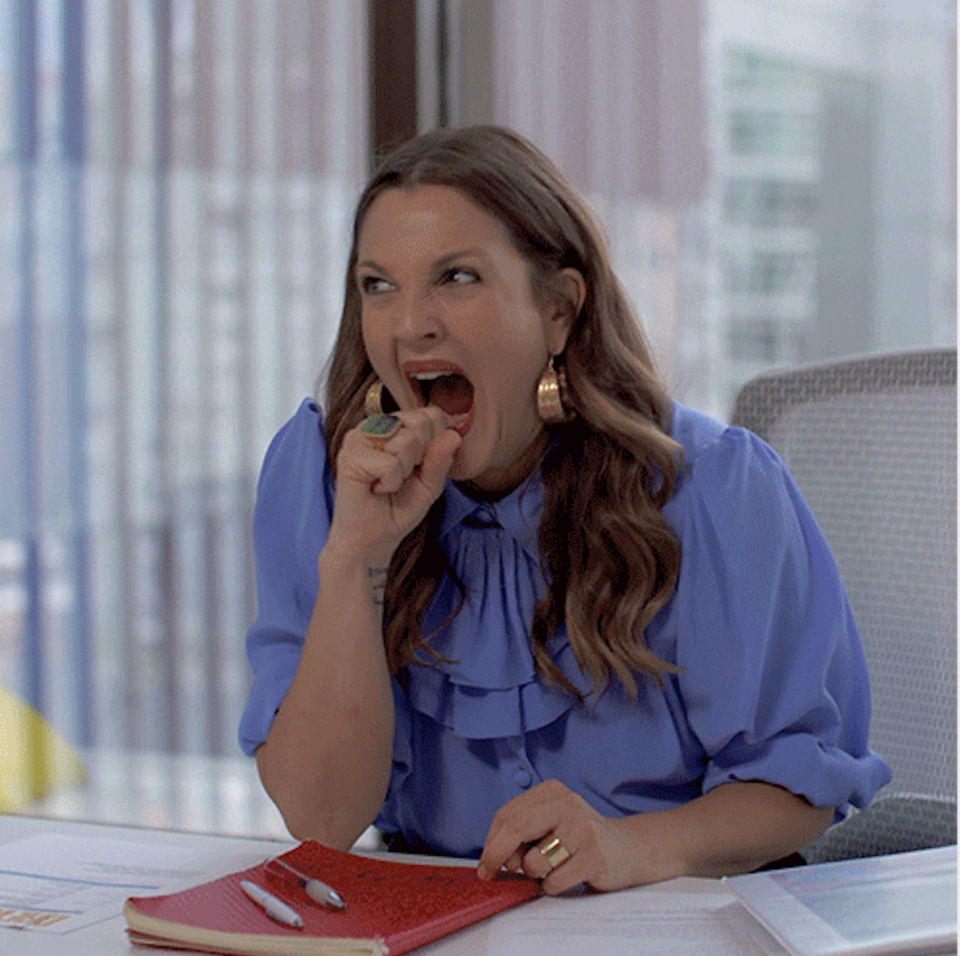 a woman about to bite on her knuckles in frustration