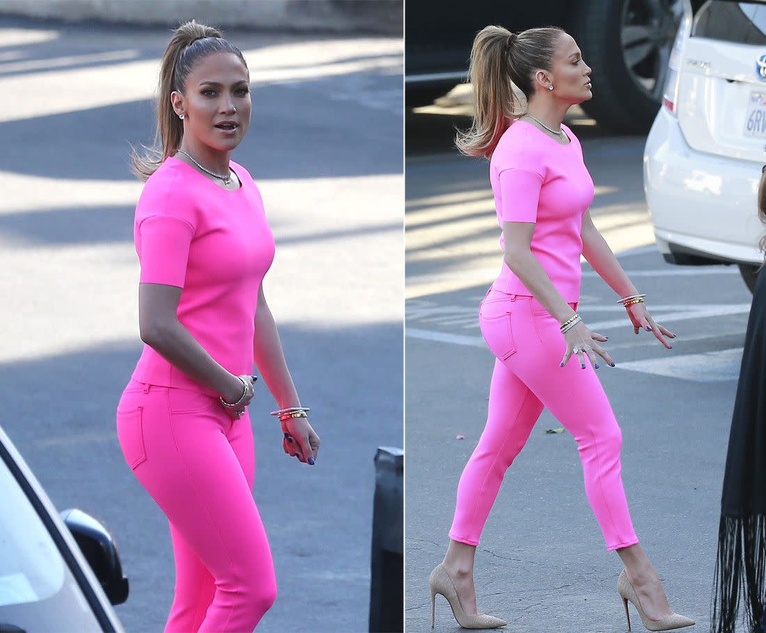 Talk about hot pink! Jennifer Lopez showed off her curves in a tight pink outfit on her way to "American Idol" in Los Angeles on March 12, 2014.