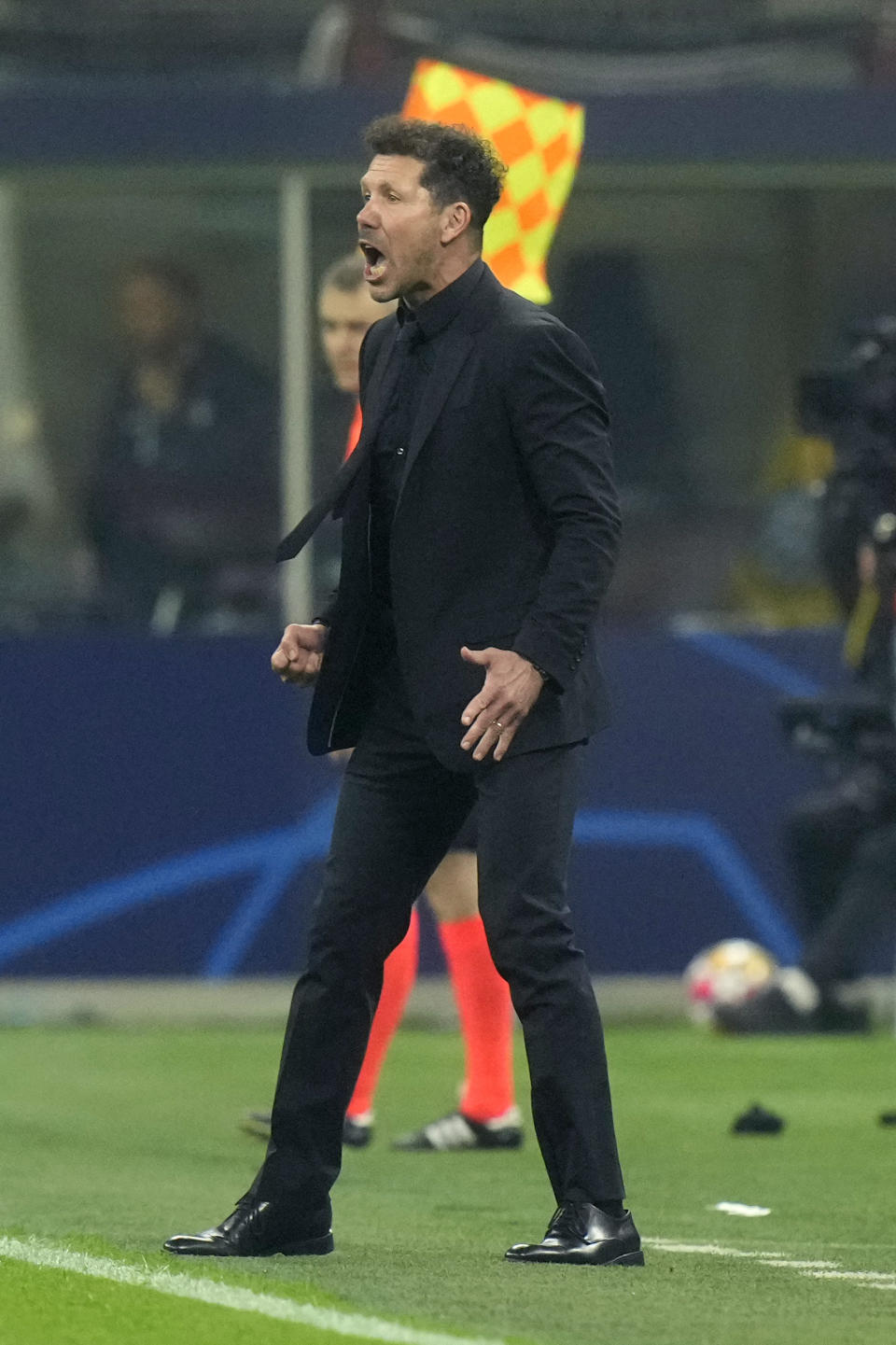 Atletico Madrid's head coach Diego Simeone reacts during the Champions League, round of 16, first leg soccer match between Inter Milan and Atletico Madrid, at the San Siro stadium in Milan, Italy, Tuesday, Feb. 20, 2024. (AP Photo/Luca Bruno)