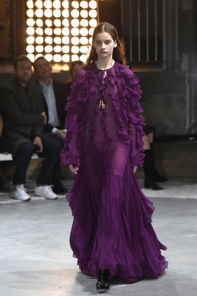 Giambattista Valli opts for a long, floaty dress in a slightly softer shade, finished with multiple frills for a chic, romantic style. Paris, March 5, 2018