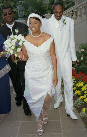 <p>Frederick M. Brown/Getty</p> Shante Broadus and Snoop Dog on their wedding day in 1997.