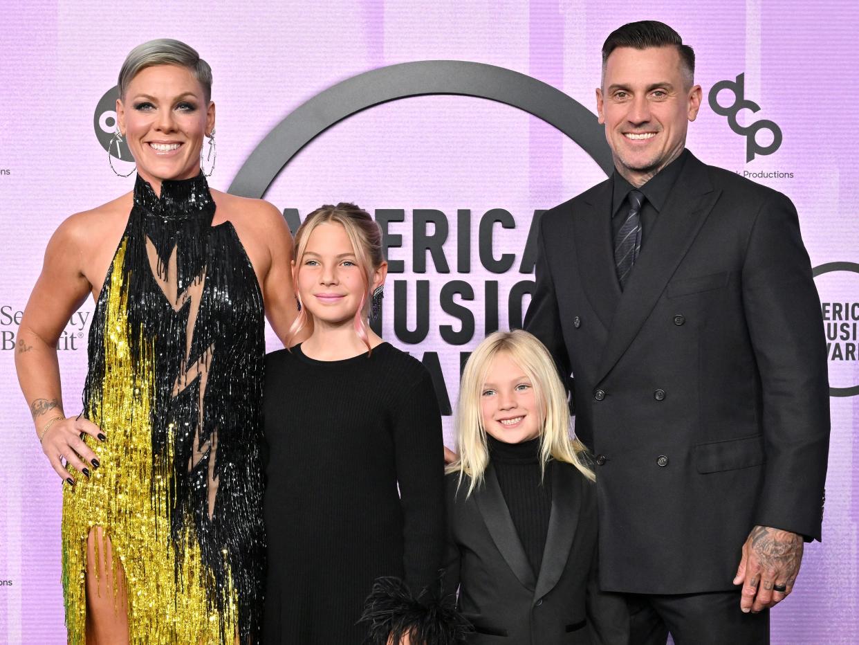 Pink, Willow Sage Hart, Jameson Moon Hart, and Carey Hart attend the 2022 American Music Awards at Microsoft Theater on November 20, 2022 in Los Angeles, California.