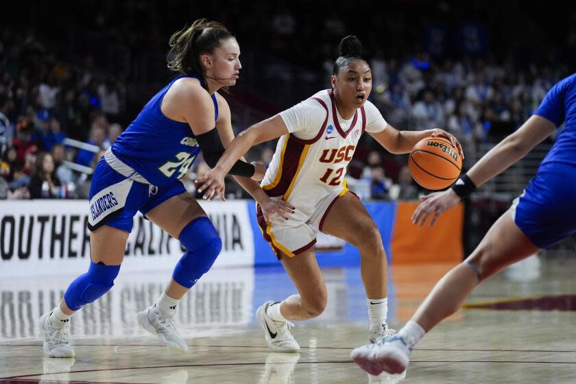 Texas A&M-Corpus Christi guard Violeta Verano (24) defends against Southern California.