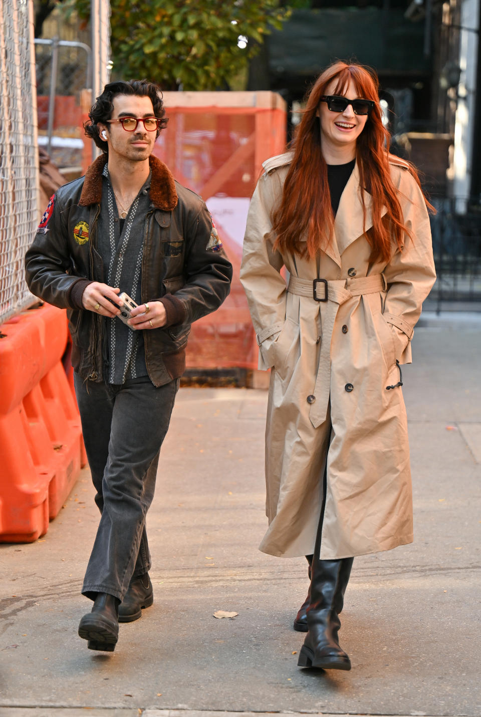 Joe and Sophie walking down the street