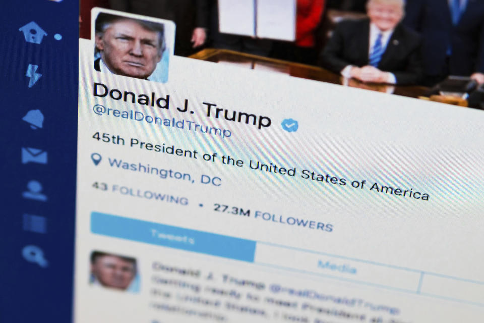 FILE - This April 3, 2017, file photo shows U.S. President Donald Trump's Twitter feed on a computer screen in Washington. President Donald Trump is claiming that Twitter has removed “many people” from his account. But he appears to have actually gained followers since the beginning of October. According to the Internet Archive’s Wayback Machine, which collects snapshots of web pages over time, Trump had 54.8 million followers on Oct. 1. He had 55.3 million as of Friday, Oct. 26, 2018. (AP Photo/J. David Ake, File)