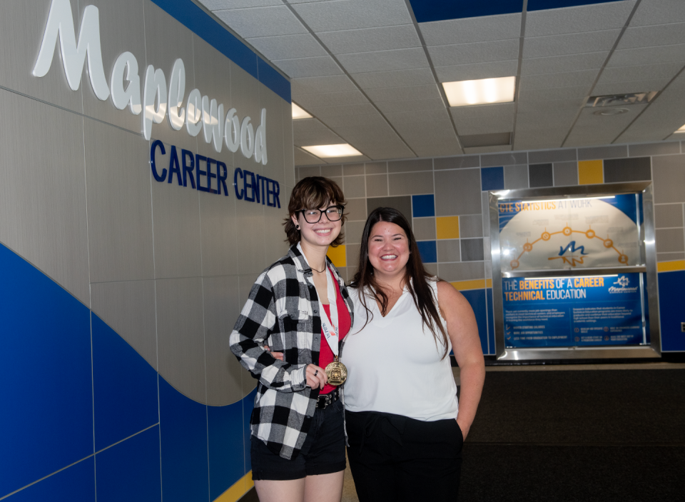 Sarah Penix, national winner of the SkillsUSA Medical Assisting contest, with Alexis Rutledge, her medical assisting instructor, at Maplewood Career Center.