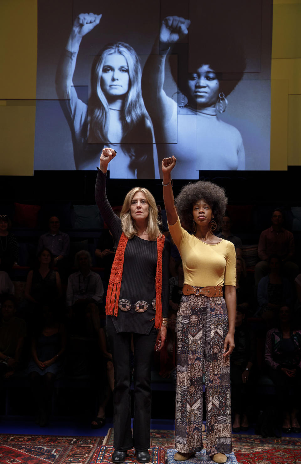 In this image released by PBS, Christine Lahti, portrays Gloria Steinem, left, and Fedna Jacquet portrays Dorothy Pitman Hughes in a scene from "Gloria - A Life." The taped theater production airs Friday on PBS. (Joan Marcus/PBS via AP)