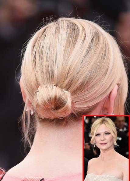 Chongo para chicas de cabello corto. Si creías que la longitud de tu melena no te permitía hacerte un chongo, te traemos la solución: mira cómo Kirsten Dunst lució este simple y sentador peinado. - Foto: Ian Gavan/Pascal Le Segretain /Getty Images