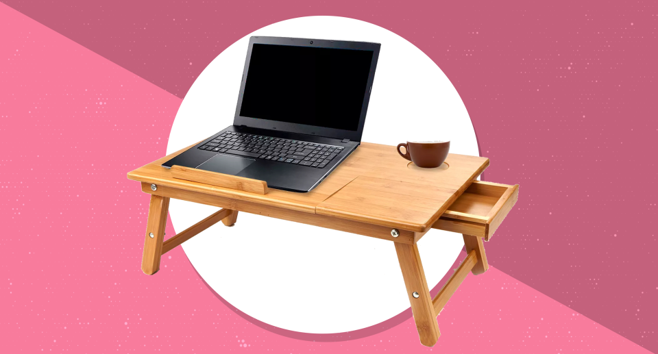 This extra-wide workstation comes complete with a beverage coaster. (Photo: Target)