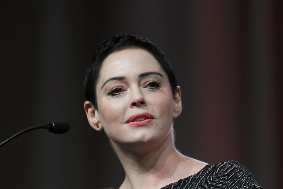 FILE- In this Oct. 27, 2017, file photo, actress Rose McGowan speaks at the inaugural Women's Convention in Detroit. McGowan said Thursday, May 24, 2018, she’s “still in shock” that Harvey Weinstein will finally be appearing in court in New York City, and she sees it as a win for all of the women who have accused him of sexual misconduct. McGowan was one of Weinstein’s earliest accusers. She says he raped her more than 20 years ago. (AP Photo/Paul Sancya, File)