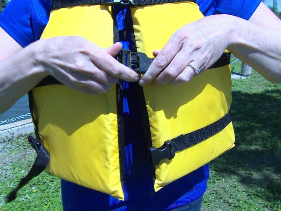 A properly fitting life-jacket is an essential piece of equipment in water activities, drowning prevention advocacy groups say.  (CBC News - image credit)