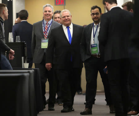 Progressive Conservatives leadership race candidate Doug Ford walks the hallway while waiting for election decision after results were put on hold due to a ballot discrepancy in Markham, Ontario, Canada, March 10, 2018. REUTERS/Fred Thornhill