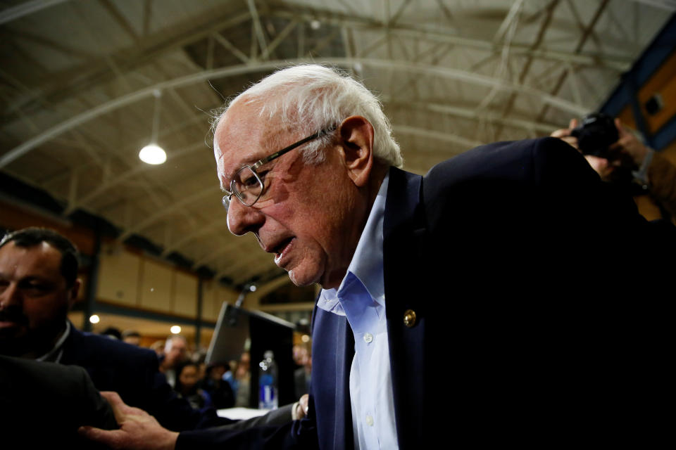 Democratic U.S. presidential candidate Senator Bernie Sanders leave the stage during a campaign town hall event in Exeter, New Hampshire, U.S., January 18, 2020.  REUTERS/Elizabeth Frantz