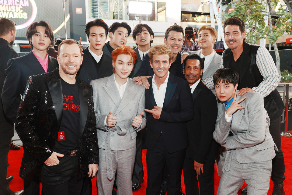 <p>Boy bands, unite! The guys of New Kids on the Block come together with pop sensations BTS on Nov. 21 at the American Music Awards in Los Angeles. </p>