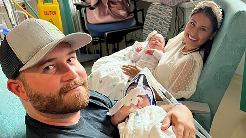 PHOTO: Sandy and Jesse Fuller hold their twin daughters after the babies underwent successful separation surgery. (Texas Children's Hospital)