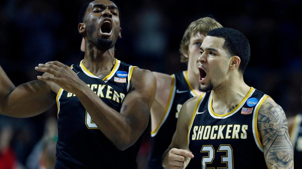 Mandatory Credit: Photo by Michael Dwyer/AP/Shutterstock (6045954m)Rashard Kelly, Fred VanVleet Wichita State's Rashard Kelly (0) and Fred VanVleet (23) react during the second half of a second round game against Miami in the NCAA men's college basketball tournament in Providence, R.