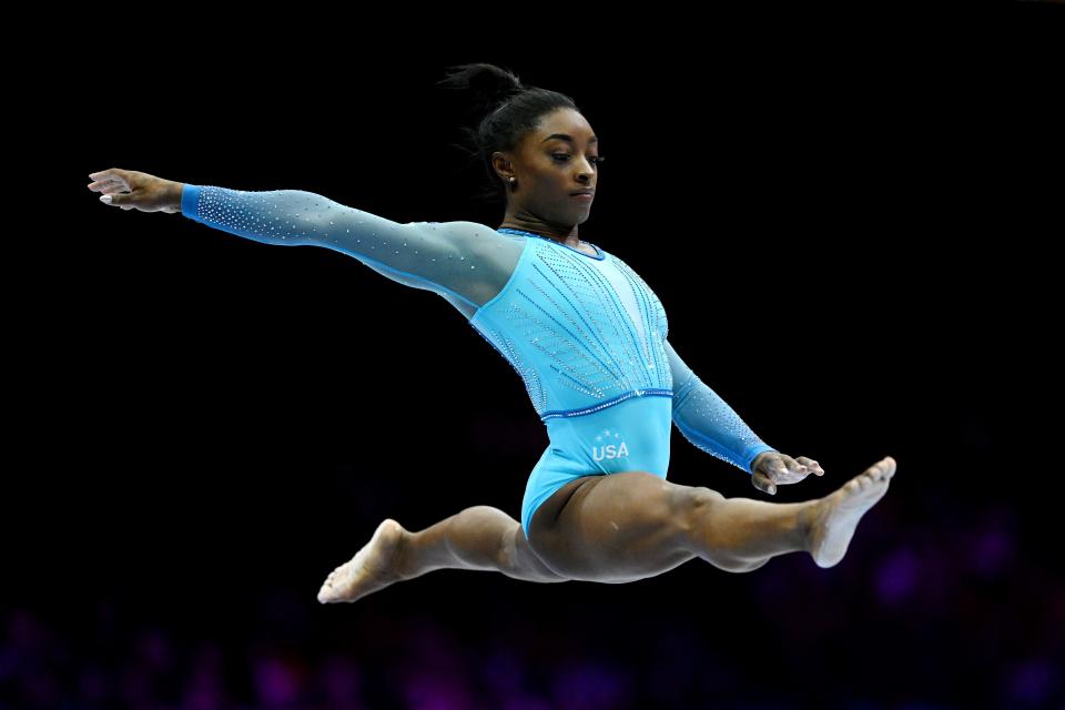 Simone Biles competes on balance beam during women's qualifications on Day Two of the FIG Artistic Gymnastics World Championships at the Antwerp Sportpaleis on Oct. 1, 2023 in Antwerp, Belgium.