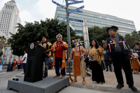 The inaugural "Indigenous People's Day" begins with a sunrise celebration in downtown Los Angeles after the Los Angeles City Council voted to establish the second Monday in October as "Indigenous People's Day", replacing Columbus Day, in Los Angeles, California, U.S., October 8, 2018. REUTERS/Mike Blake