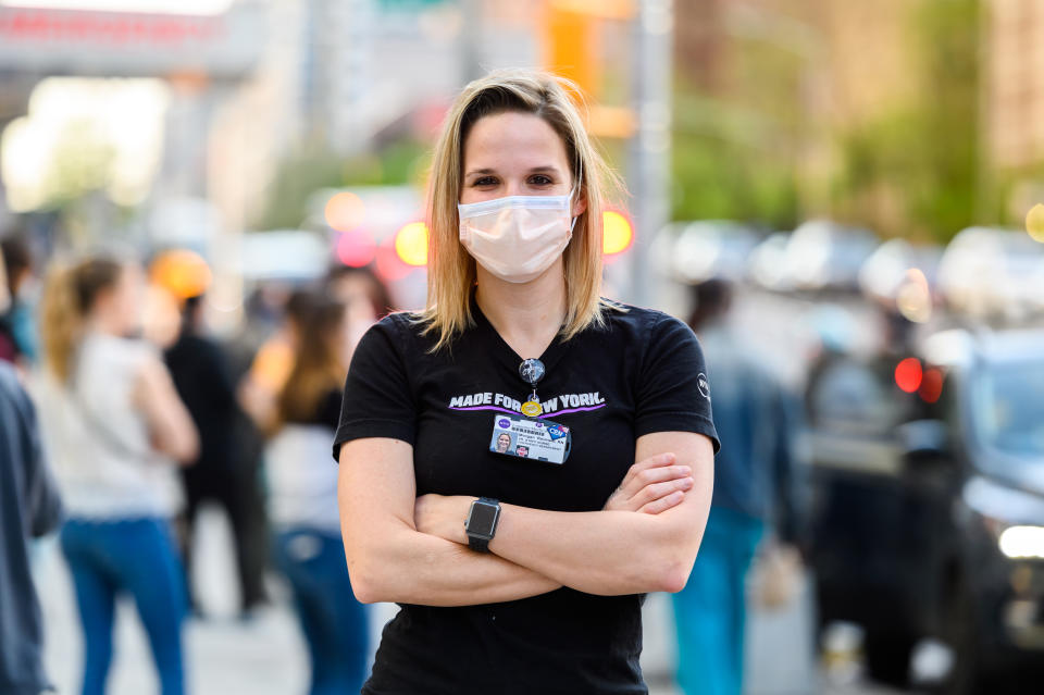 A medical worker poses for a portrait outside NYU Langone Health hospital as people applaud to show their gratitude to medical staff and essential workers during the coronavirus pandemic on May 3, 2020 in New York City. (Photo: Noam Galai/Getty Images)