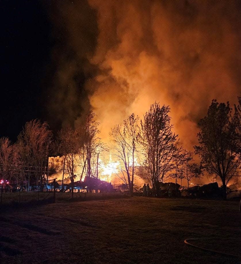 Multiple agencies responded to a three-alarm barn fire Thursday night in Amity, including crews from SW Polk Fire District.