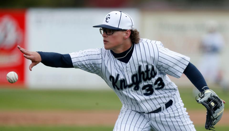 Central Catholic Knights Brinn Robbins (33) throws the ball home during the IHSAA baseball game against the Rossville Hornets, Friday, April 28, 2023, at Central Catholic High School in Lafayette, Ind. Central Catholic won 9-3.